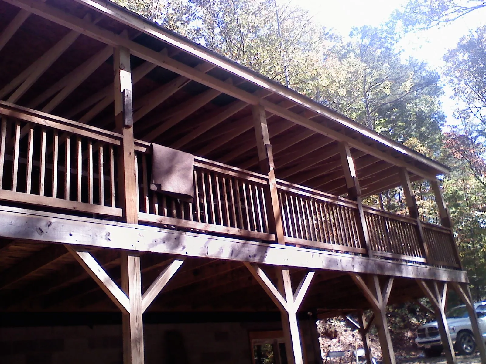 Timber framing under a new elevated porch and deck — Roof Leak Repair in Oxford Junction by Roofing Brothers